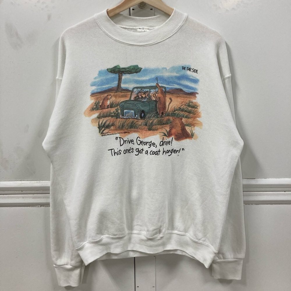 1987 The Far Side Comic “Drive George! This one has a coat hanger” Crewneck L